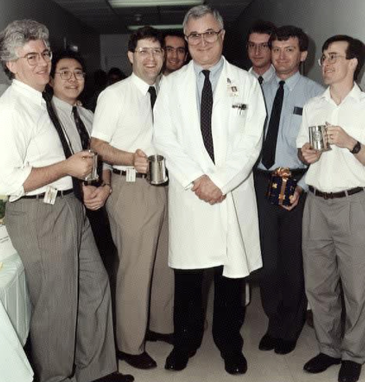 Dr. David E. Kuhl with colleagues in 1992