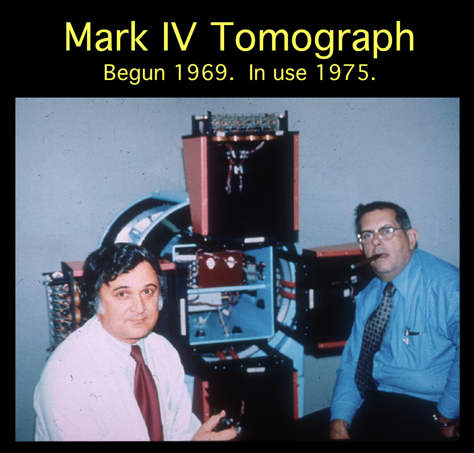 Mark IV Tomograph, begun in 1969 and placed in use in 1975, shown with members of its development team